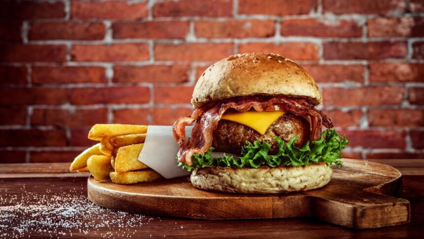 A perfect burger with texture and taste alongwith best burger toppings & fries